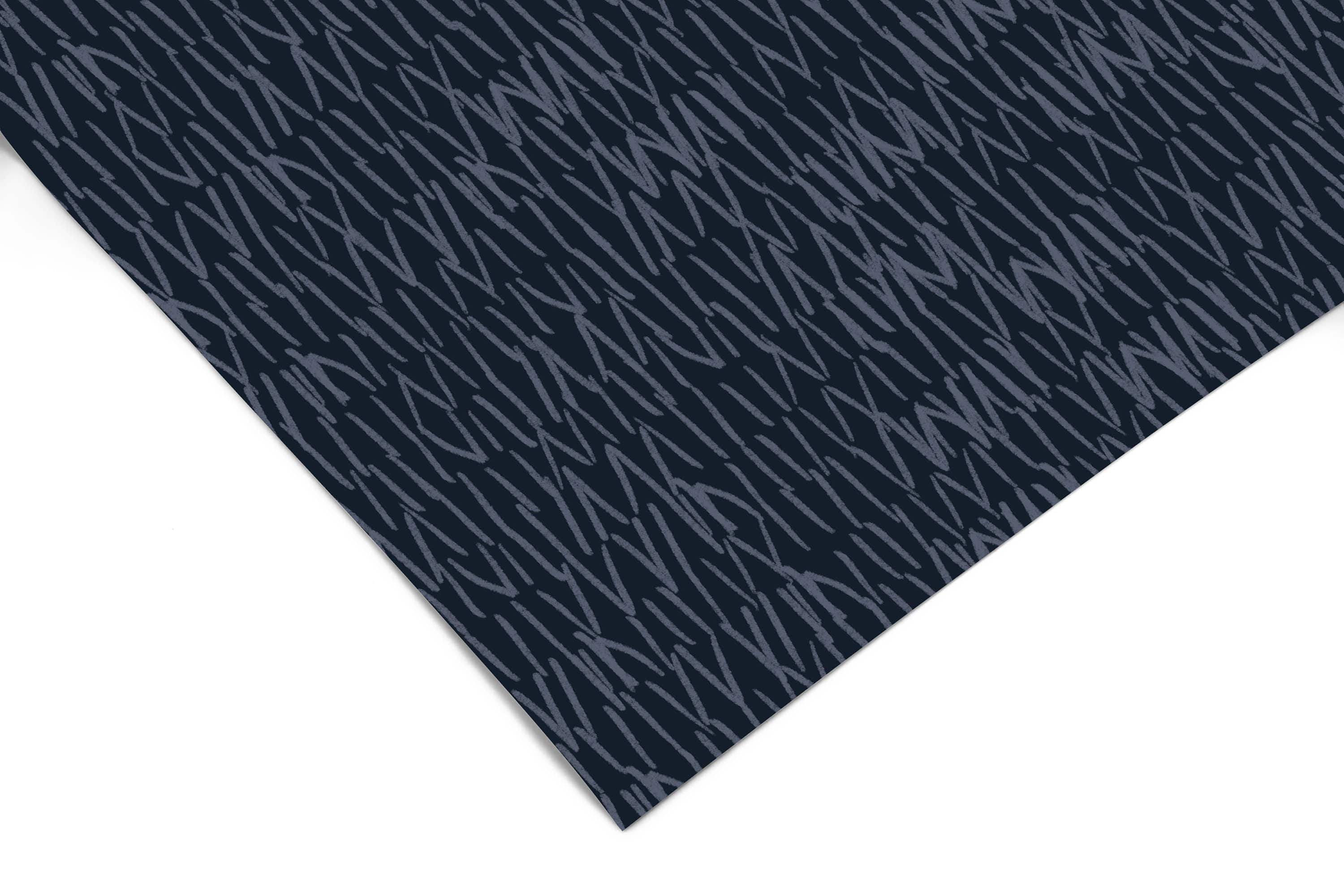 Close-up of navy blue abstract line wallpaper pattern and texture