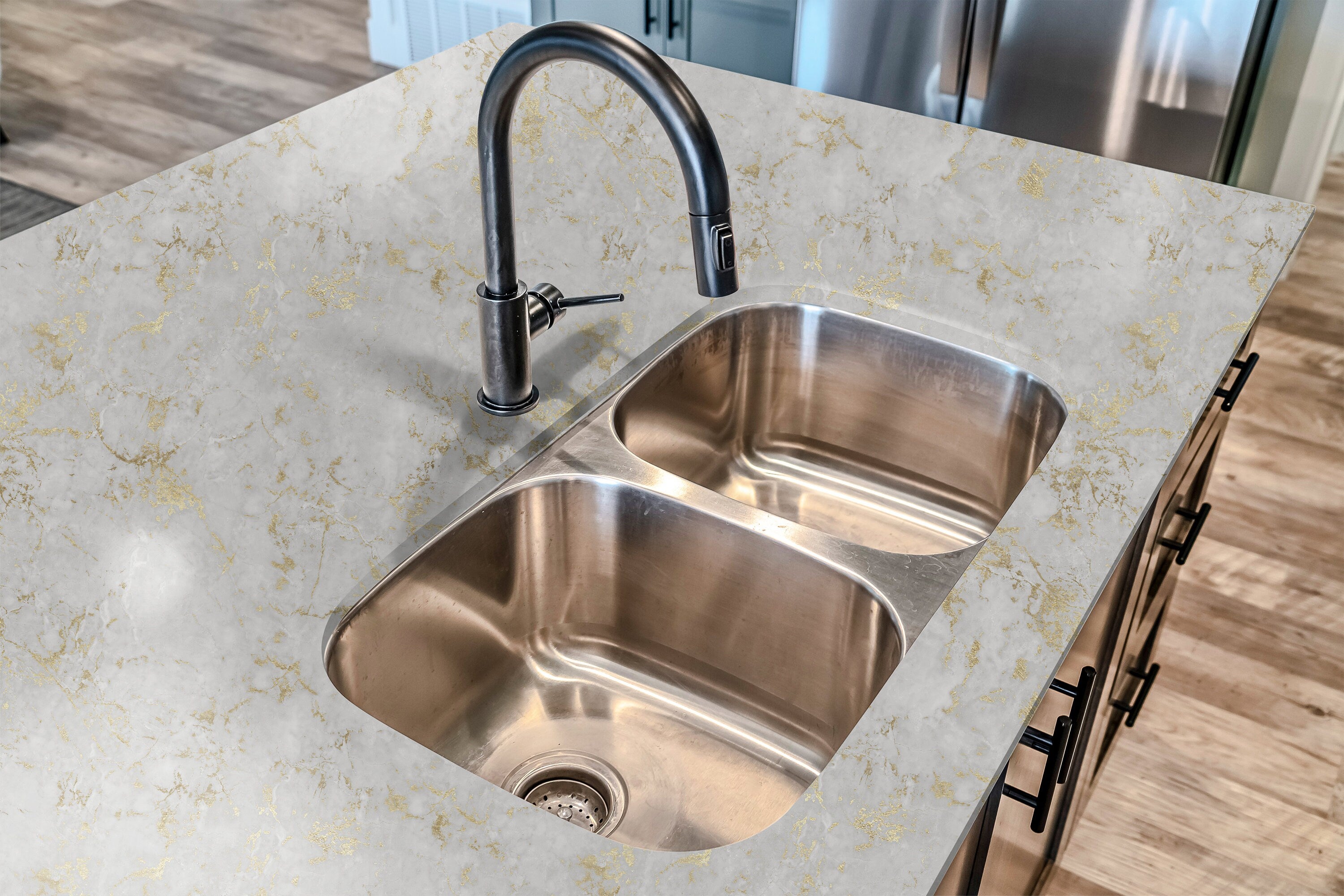 Countertop 11: A modern kitchen countertop covered in white marble-patterned film with delicate gold veining, offering a luxurious and elegant stone look.