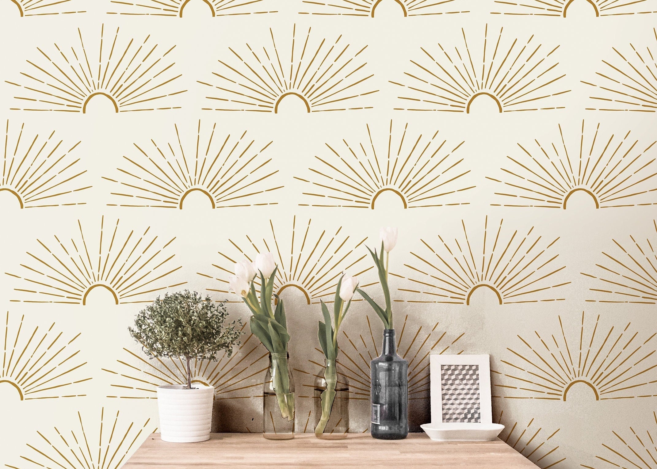 Wallpaper 3809: A warm and inviting interior featuring a boho-style sunburst wallpaper with golden hand-drawn sunrays, creating a cozy and modern aesthetic with natural decor elements.