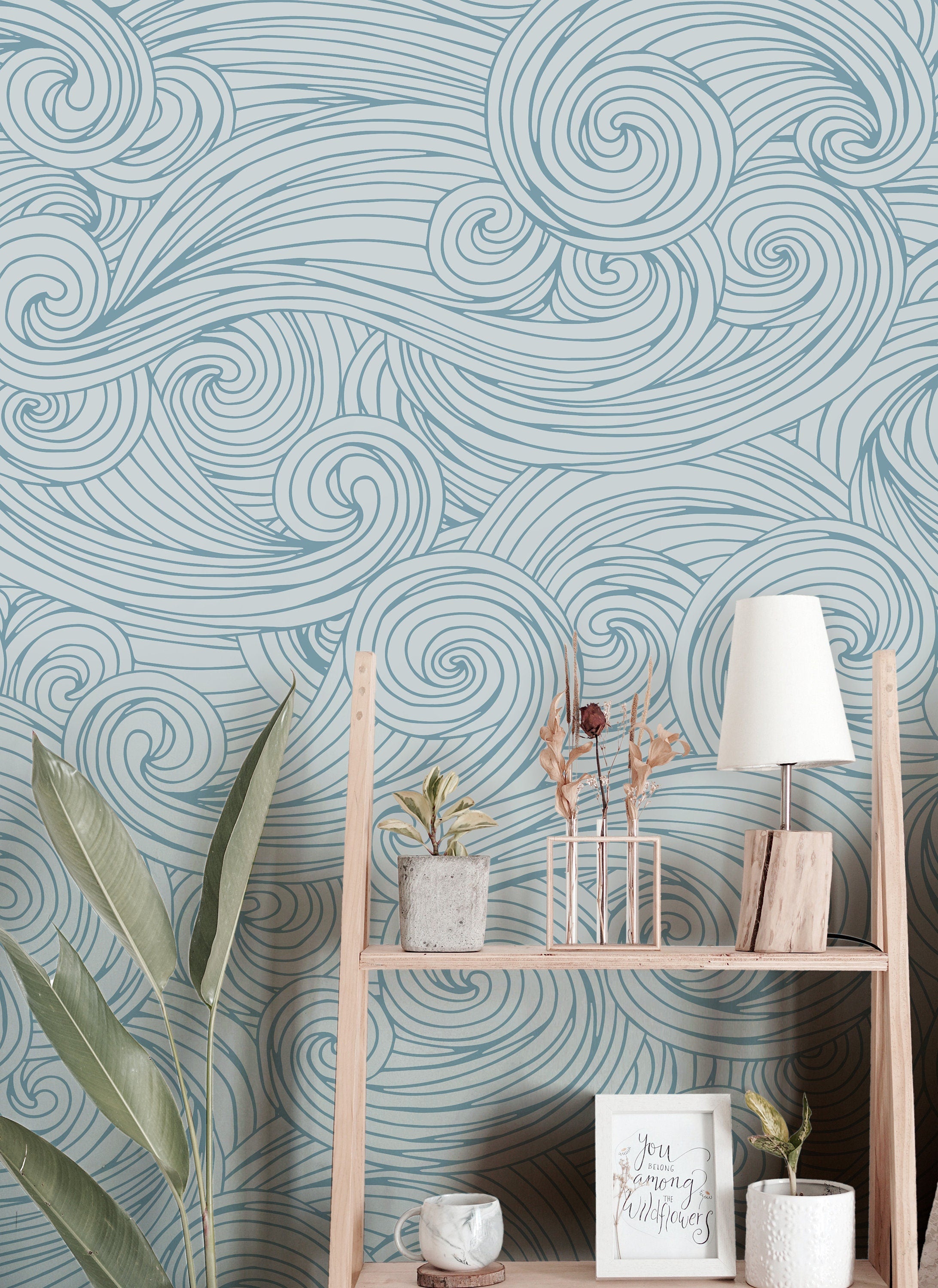 Wallpaper 3834: A calming blue ocean wave wallpaper with intricate swirling patterns, perfect for creating a tranquil coastal-inspired space.