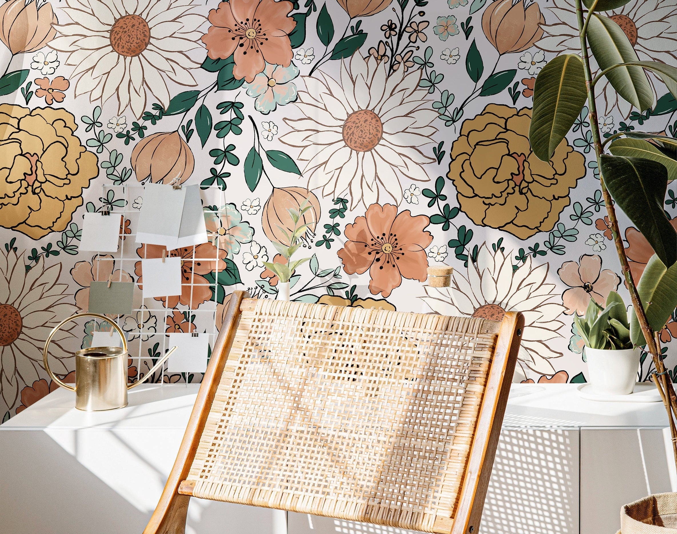  Wallpaper 142: A cozy sunlit living space featuring a large-scale floral wallpaper with warm golden and peach-toned blooms, creating a vintage-inspired, boho-chic ambiance.