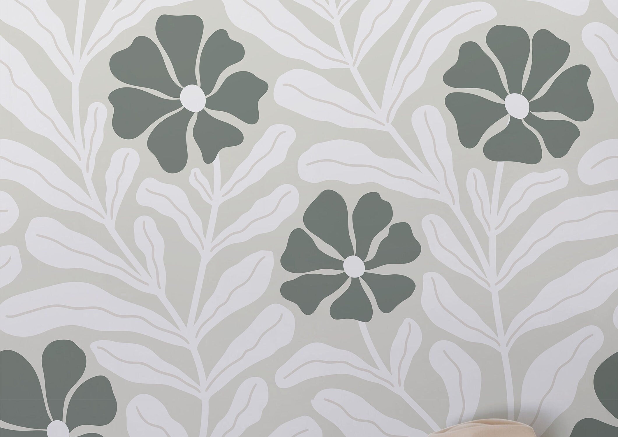 Wallpaper 921: Soft green wallpaper with abstract floral motifs and white leafy stems, styled with a wooden shelf, folded sweater, and ceramic mug for a cozy, organic vibe.